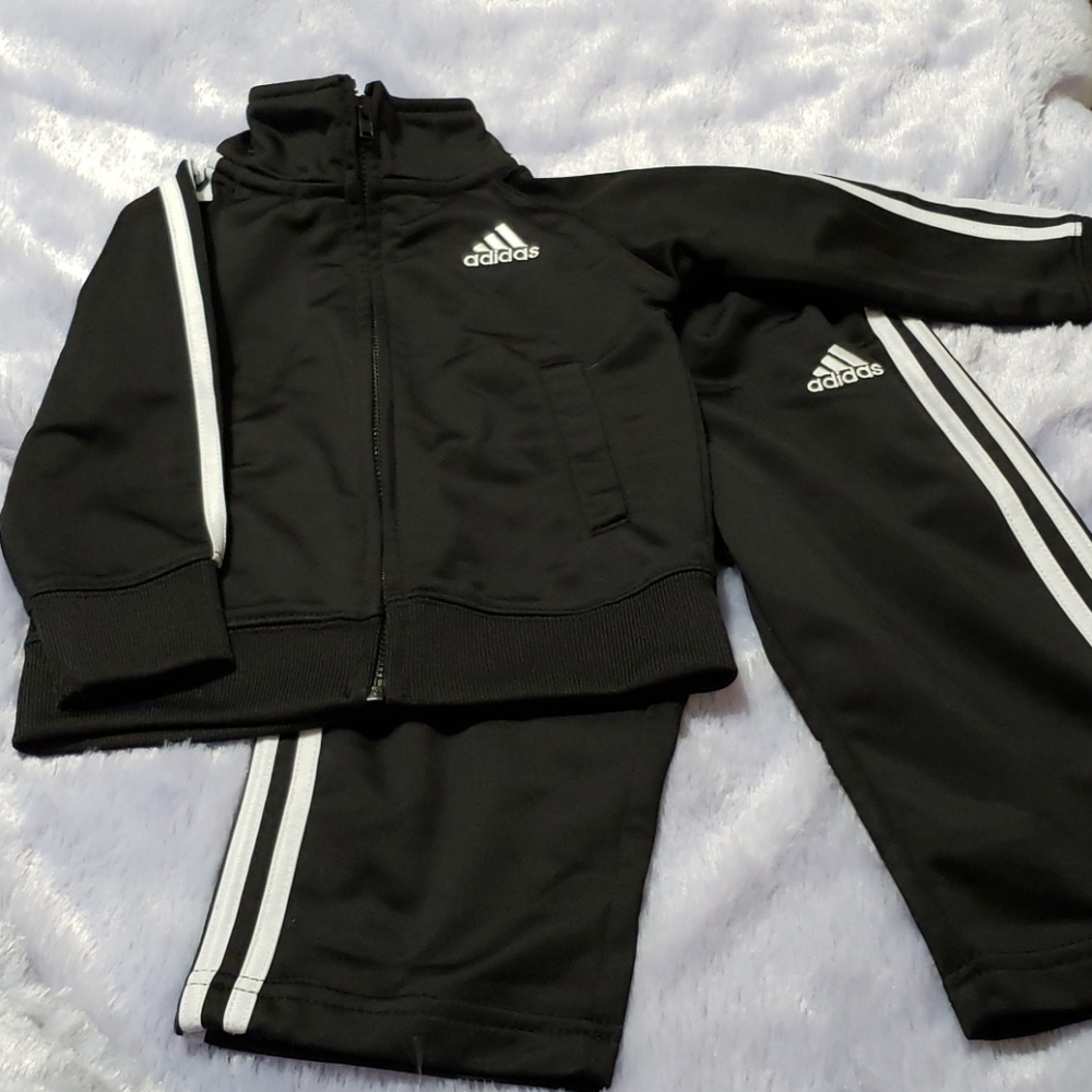 Black 3 stripe Adidas track suit